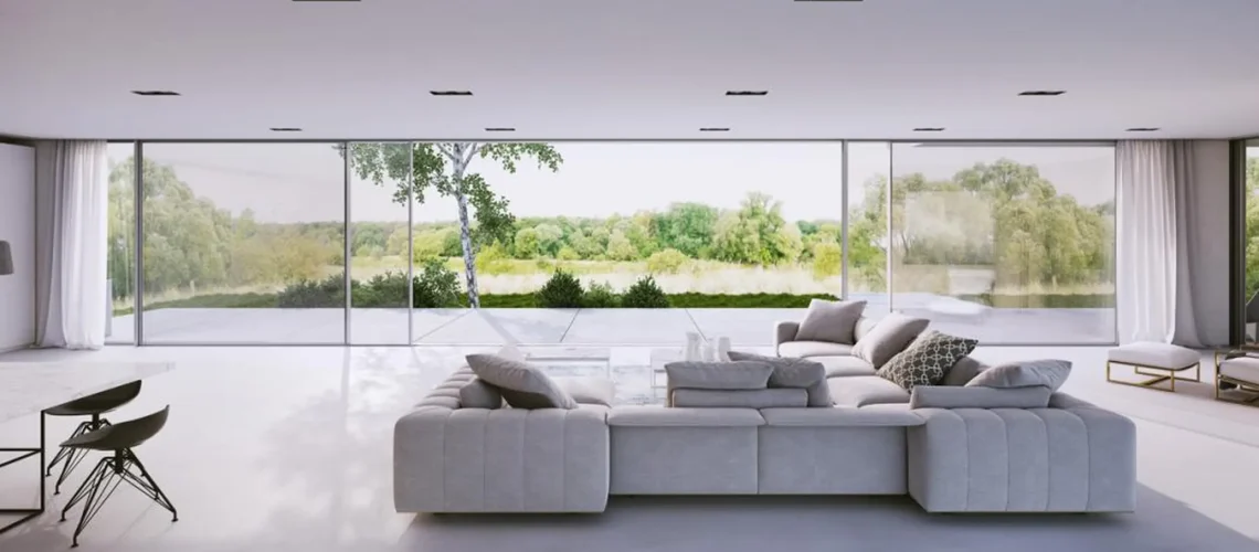 Drzwi i okna przesuwne tarasowe produkowane w Łodzi przez firmę MS Aluminium. Widok z wnętrza domu.